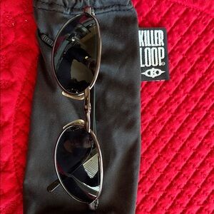 Black Sunglasses with gun metal frames.